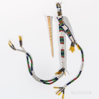 Central Plains Beaded Awl Case with Awl, Sioux, c. fourth quarter 19th century, with striped design and three long beaded tabs from the