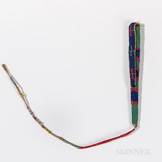 Central Plains Beaded Hide Awl Case, Sioux, fourth quarter 19th century, with beaded circular design and one long quill-wrapped drop, l