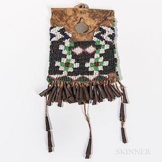 Southwest Beaded Hide Strike-a-Lite Pouch, Apache, c. last quarter 19th century, beaded on the front with multicolored geometric design