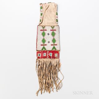 Plains Beaded Hide and Quill Pipe Bag, Lakota, c. 1900, soft hide bag beaded with multicolored geometric designs on both sides of a wid
