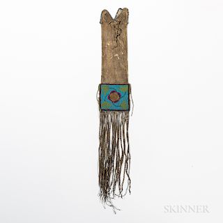 Plains Cree Beaded Hide Pipe Bag, c. last quarter 19th century, the tab-top form with multicolored beaded floral devices on a blue grou