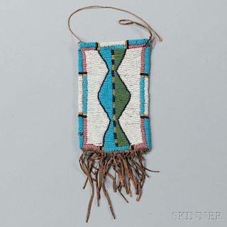 Northern Plains Beaded Hide Mirror Bag, c. 1870, with traces of red ochre overall, the front beaded with a central hourglass design, th