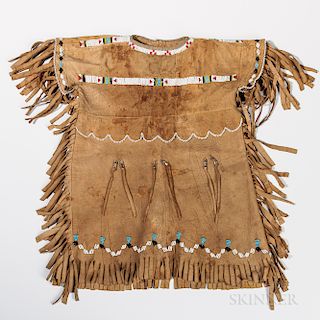 Central Plains Beaded Hide Child's Dress, 20th century, bead-and fringe-decorated soft hide dress, 19 x 16 in.Provenance: Private coll