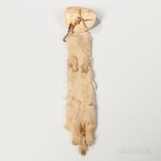 Northern Plains Hairdrop, c. 1870s/80s, a large carved circular shell pierced with attached with hide and four beads to an ermine pelt,