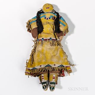 Plains Indian Beaded Hide Doll, c. 1900, Lakota, yellow painted hide dress with fringes and finely detailed beadwork on dress, and high