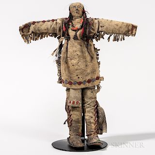 Cheyenne Beaded Hide Doll, fourth quarter 19th century, finely detailed beadwork, with fabric and horsehair plaited hair, and elaborate