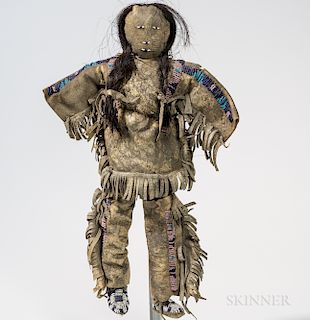 Plains Beaded Hide Doll, Lakota, fourth quarter 19th century, male doll with partially beaded and fringed shirt, leggings, and beaded m