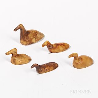 Five Eskimo Game Pieces, Alaska, historic period, in the shape of swimming birds, lg. 1 1/2 to 1 1/4 in.Provenance: Dr. John Schaeffer