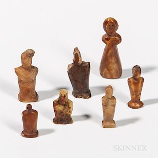 Seven Eskimo Torso Figures, Alaska, Thule culture, seven small human figures, (some surface loss), ht. 3/4 to 1 3/4 in.Provenance: Dr.