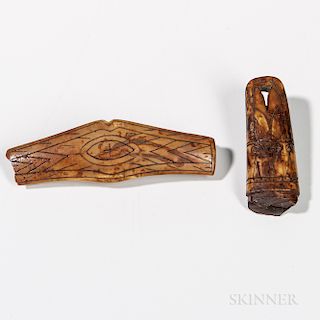 Two Eskimo Fragments, Alaska, Punuk, 500-1200 AD, a sled line runner and a tool handle, both decorated with finely incised line designs
