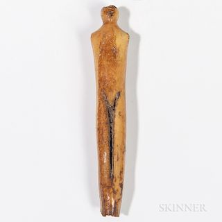Eskimo Figure, Alaska, Punuk, 500-1200 AD, elongated male torso, (minor surface loss and loss to part of the head), lg. 4 1/4 in.