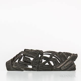 Northwest Coast Argillite Panel Pipe, Haida, c. 1860s, classic openwork form, very finely carved with a reclining raven with long open