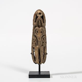 Northwest Coast Shaman's Amulet, Tlingit, fourth quarter 19th century, "Devil Fish" figure carved from walrus tusk, ht. 4 in.Provenanc
