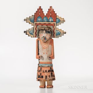 Large Hopi Wood Katsina, with white-painted body and short orange legs, forearms and shoulders also orange, the elaborate casemask with