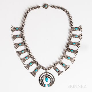 Navajo Silver and Turquoise Squash Blossom Necklace, c. 1940s, with large handmade silver beads, fourteen turquoise-inlaid blossoms wit