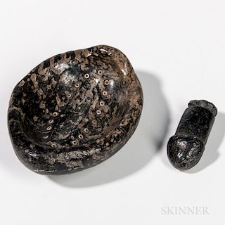 Chumash Black Stone Mortar and Pestle, 19th century, scooped out stone with inserted beads surrounding central groove, with phallic-for