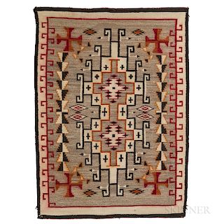 Navajo Regional Rug, c. 1930s, woven with natural and synthetic spun wool, with elaborate geometric designs on a variegated gray backgr
