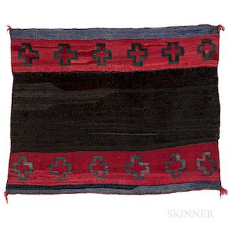 Navajo Twill Weave Manta, c. 1900, handspun wool in natural dark brown and hand dyed aniline red and blue, the central dark brown field
