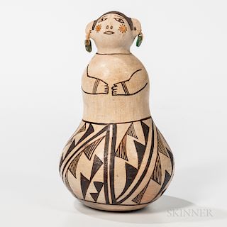Contemporary Acoma Pottery Figure, Juana Leno (1917-2000) Syo-ee-mee, the woman wears turquoise earrings, signed on base, ht. 8 1/2 in.
