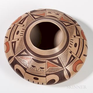 Hopi Polychrome Pottery Jar, by James Nampeyo, signed on the bottom, shoulder painted in abstract designs, ht. 5 1/2, dia. 12 in.Proven