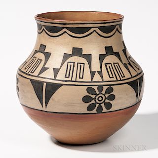 Santo Domingo Polychrome Pottery Jar, signed on the base "Loreucita and Juan Pino, Tesuque", deep rounded form with small indented base