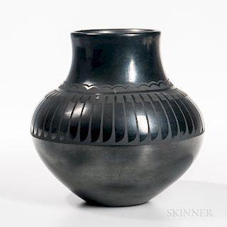 San Ildefonso Black-on-black Pottery Jar, signed "Maria, Popovi 662," with classic feather design above at the shoulder, with first pri