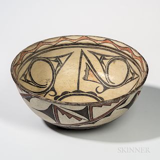 Large Zuni Polychrome Pottery Dough Bowl, c. 1900, slightly flared at the rim and painted on the inside with a classic three-part volut