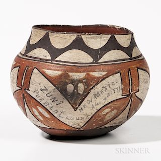 Southwest Polychrome Pottery Jar, Laguna Pueblo, 19th century, abstract designs on a cream ground, inscription on one side "Zuni pueblo