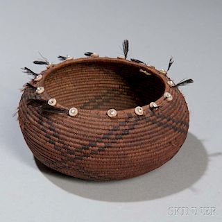 Southwest Coiled Basketry Bowl, Pomo, early 20th century, tightly woven with geometric designs and with remnant feather, shell, and gla