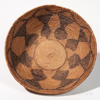 Large Washoe Polychrome Basketry Bowl, Nevada, c. 1875-85, flat-bottom form with repeated geometric designs decorating the sloping side