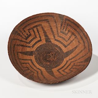 Southwest Coiled Basketry Tray, c. early 20th century, with a pinwheel design, ht. 4 3/8, dia. 17 in.