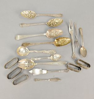 Sterling silver lot to include two pairs of English silver berry spoons. 16.4 t oz.