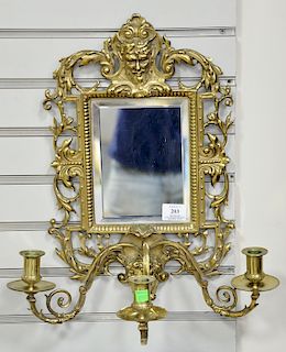 Black Starr & Frost brass two light mirrored sconce. ht. 20 in., wd. 16 1/2 in.