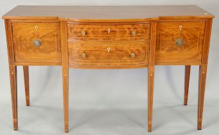 Custom Federal style sideboard having two center drawers flanked by door and drawer. ht. 37 in., wd. 61 in.