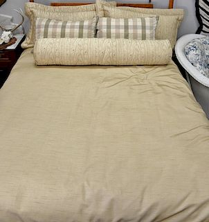 Comforter set including duvet cover with down filled interior and five matching pillows.