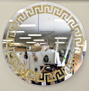 Two mirrors including a round mirror with Greek key design (dia. 30 in.) and a rectangular mirror with carved block frame (36" x 18").