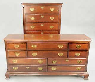 Four piece mahogany Stoneleigh bedroom set to include a four post queen bed, ht. 88 in., triple chest and mirror, ht. 68 in., and ch...