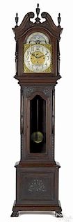 Mahogany musical tall case clock, ca. 1910, with a brass face eight-day works