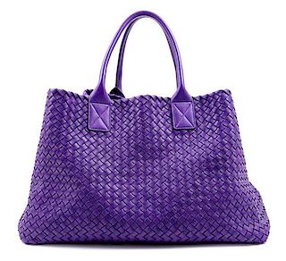 A Bottega Veneta Purple Intrecciato Leather Tote, 11.25" H x 19.5" W x 9" D; Handle drop: 7"; Pouch: 6.25" x 10.5".
