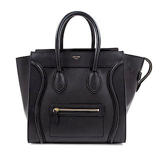 A Celine Black Smooth Leather Luggage Tote Bag, 12" H x 12" W x 7" D; Handle drop: 6".