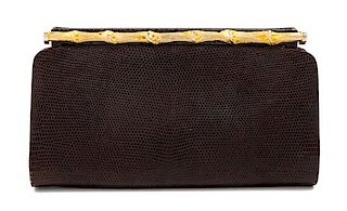A Gucci Brown Snakeskin Clutch, 4.75" H x 8.25" W x 1.25" D.