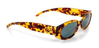 A Pair of Gucci Tortoiseshell Sunglasses,