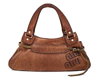 A Miu Miu Brown Leather Handbag, 7" H x 14.75" W x 6" D; Handle drop: 6.5".