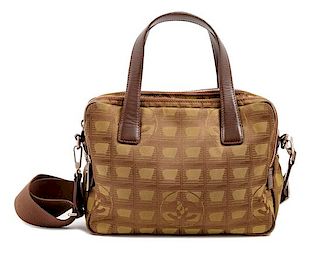 A Chanel Brown Nylon Travel Line Handbag, 8" H x 10" W x 4" D; Handle drop: 4.5".