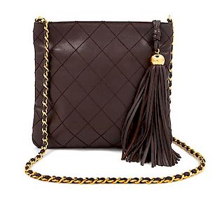 A Chanel Dark Brown Quilted Cross Body Bag, 7.5" H x 8.25" W; Strap drop: 19".