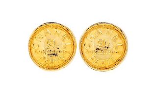 A Pair of Chanel Goldtone Coin Earclips, 1.25" diameter.