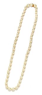 A Chanel Strand of Baroque Faux Pearls, 32" L.
