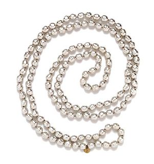 A Chanel Grey Baroque Pearl Necklace, 62" L.