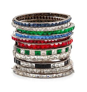 A Collection of Eleven Silvertone and Crystal Bangles,