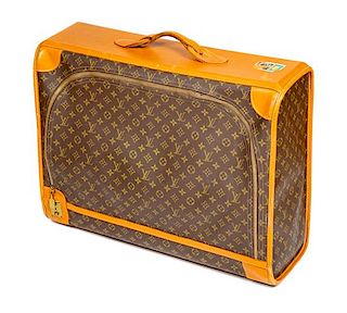 A Louis Vuitton Soft Sided Monogram Canvas Suitcase, 25" L x 19.75" H x 8.5" D; Handle drop: 2.5".